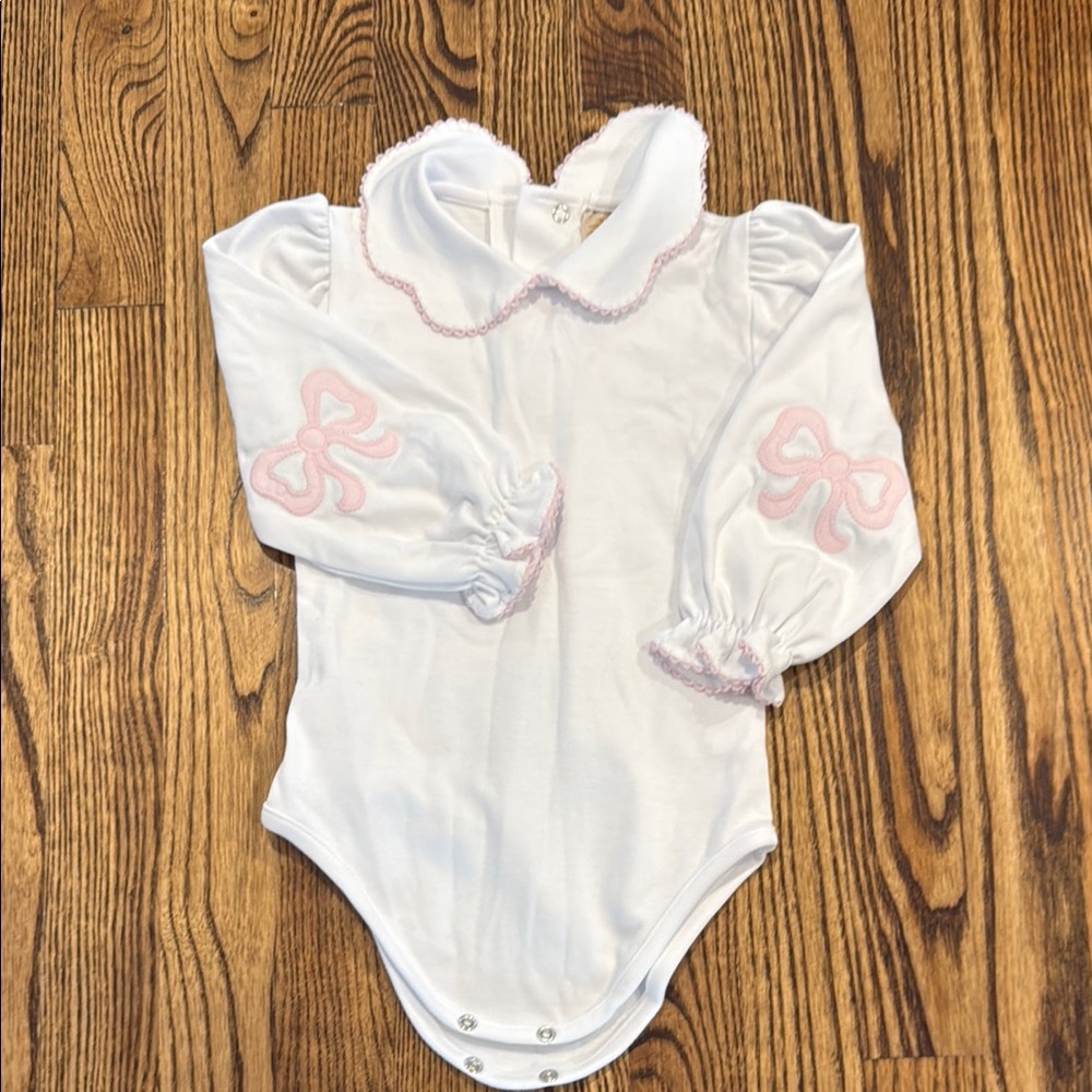 TBBC bow sleeve onesie